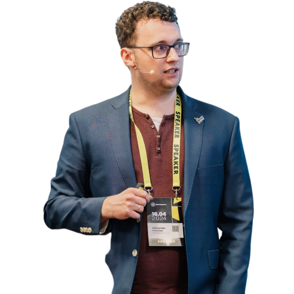 Aleksander Patschek podczas wystąpienia na konferencji